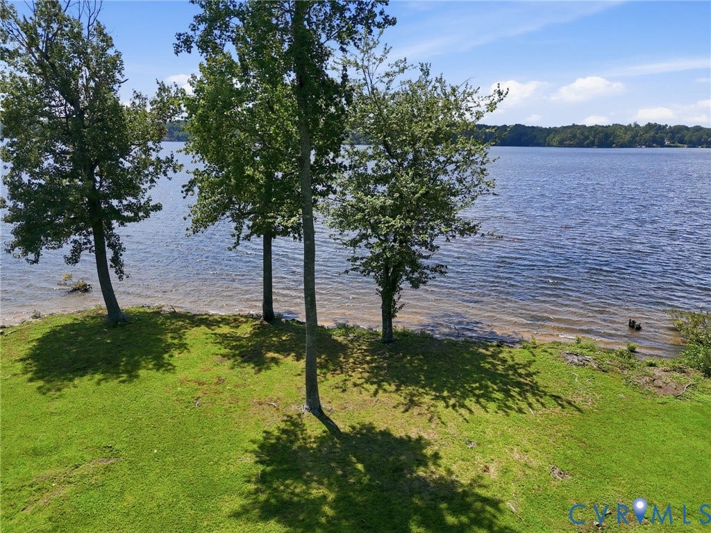 3416 Walkers Ferry Road, Walkers Ferry, Midlothian, VA 23112 Waterfront property featuring mature trees and a grassy expanse leading to the shoreline