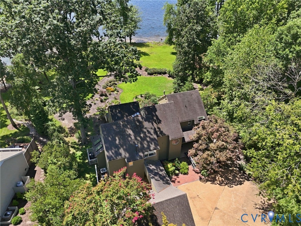 3416 Walkers Ferry Road, Walkers Ferry, Midlothian, VA 23112 Waterfront property with extensive mature landscaping, a paved driveway, and multiple rooflines