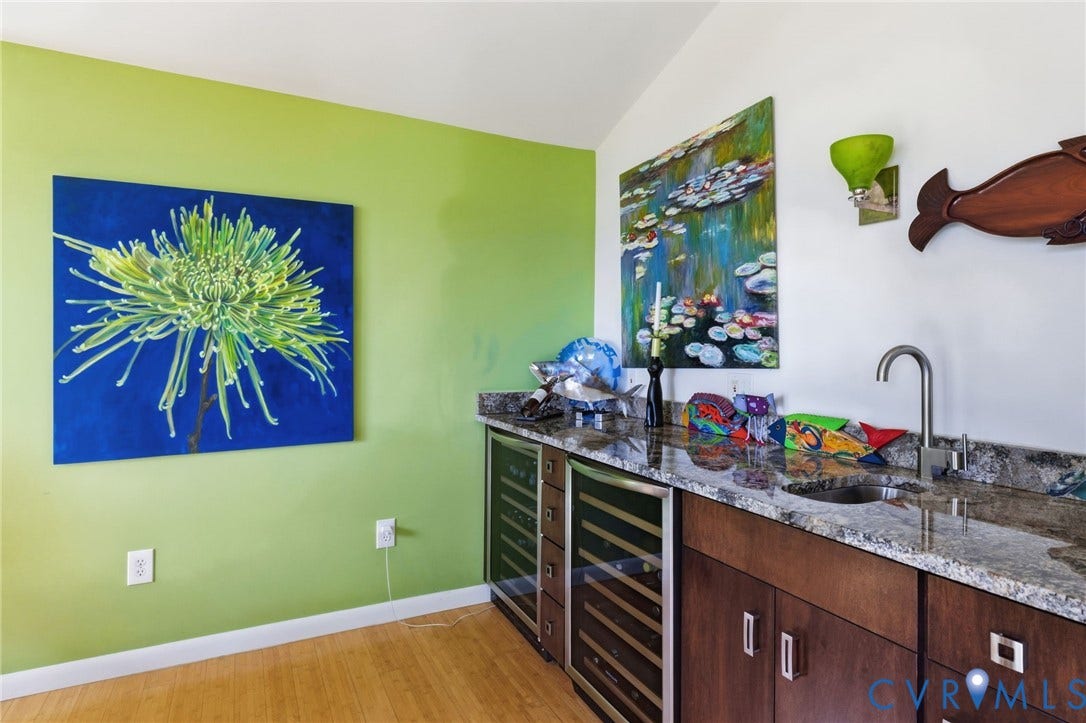3416 Walkers Ferry Road, Walkers Ferry, Midlothian, VA 23112 Built-in wet bar featuring a polished countertop, undermount sink with gooseneck faucet, integrated beverage coolers, and wood-finish cabinetry