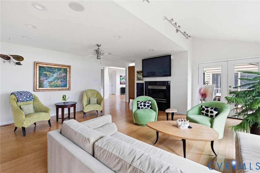 3416 Walkers Ferry Road, Walkers Ferry, Midlothian, VA 23112 Hardwood flooring, recessed lighting, vaulted ceiling, built-in fireplace, and French doors