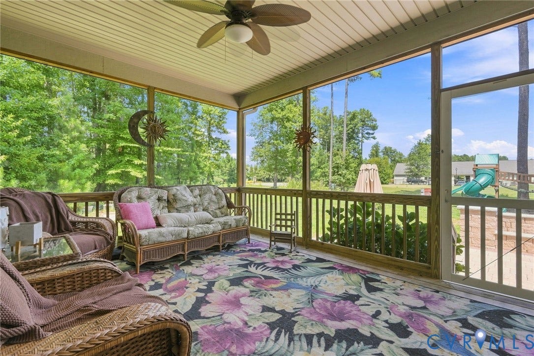 6907 Carden Park Drive, Carden Park, Moseley, VA 23120 Screened porch with a wood-finish ceiling, ceiling fan, and wood railing