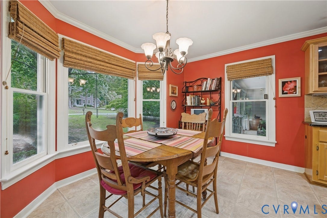 411 Hickory Drive, Manakin Sabot, VA 23103 Bay window with natural light, tile flooring, crown molding, and a chandelier
