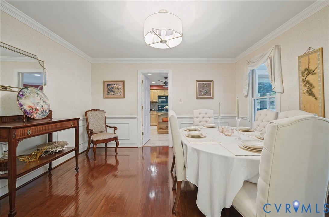 411 Hickory Drive, Manakin Sabot, VA 23103 Hardwood flooring, crown molding, wainscoting, recessed lighting, and a drum pendant light fixture