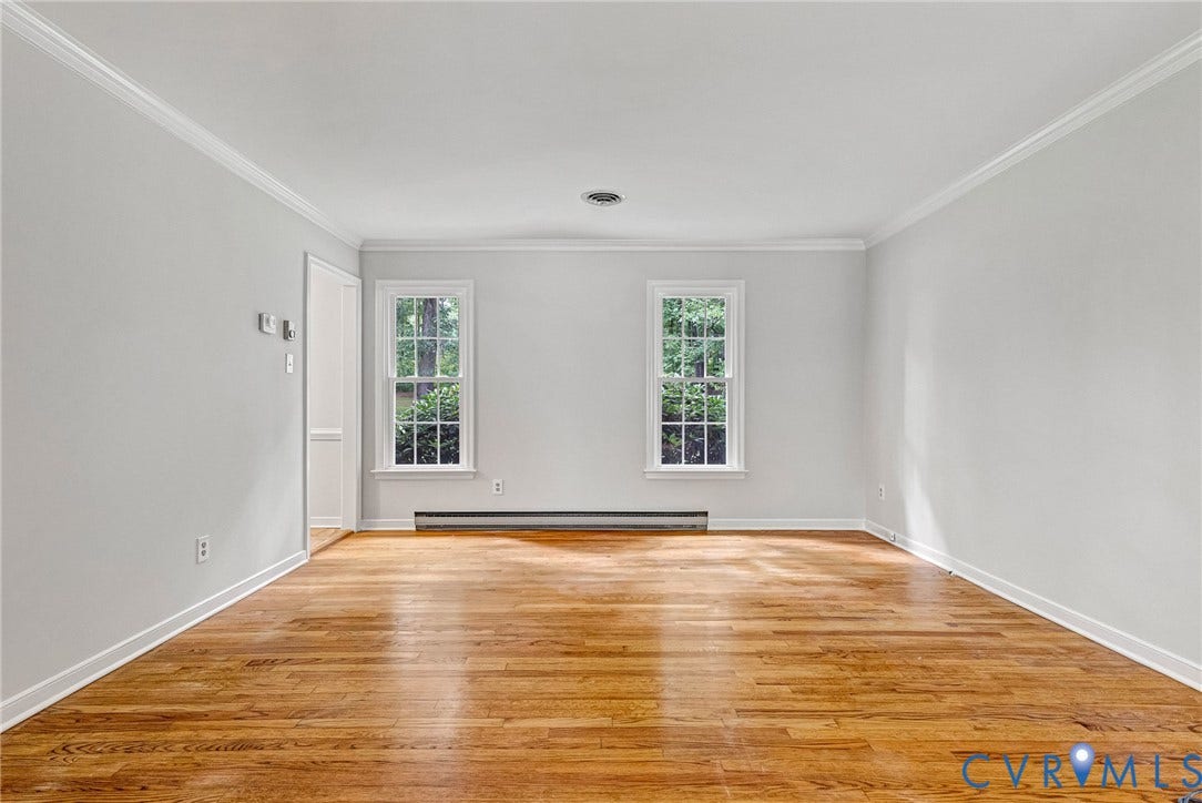 10478 Gould Hill Road, Studley, Hanover, VA 23069 Hardwood flooring, crown molding, double-hung windows, and a doorway with white trim