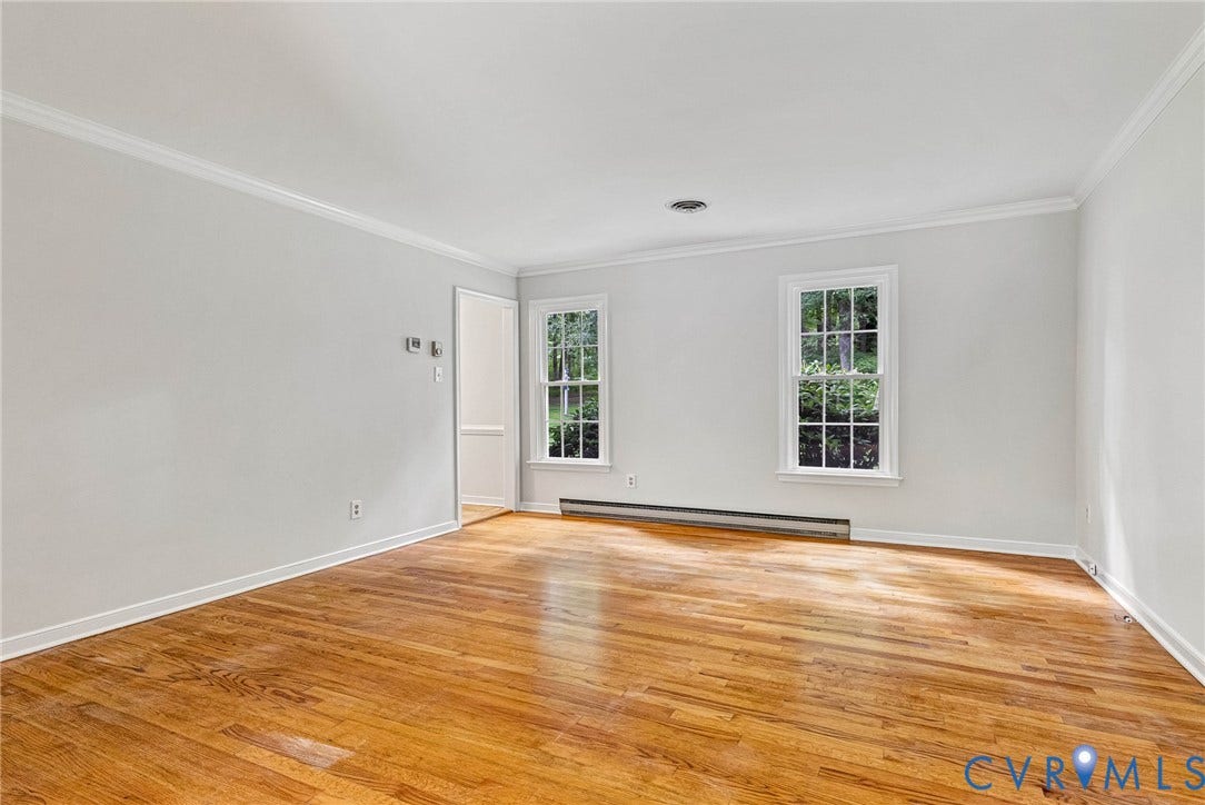 10478 Gould Hill Road, Studley, Hanover, VA 23069 Hardwood flooring, crown molding, two casement windows, and a white trim package. Freshly painted
View looking toward front of home
