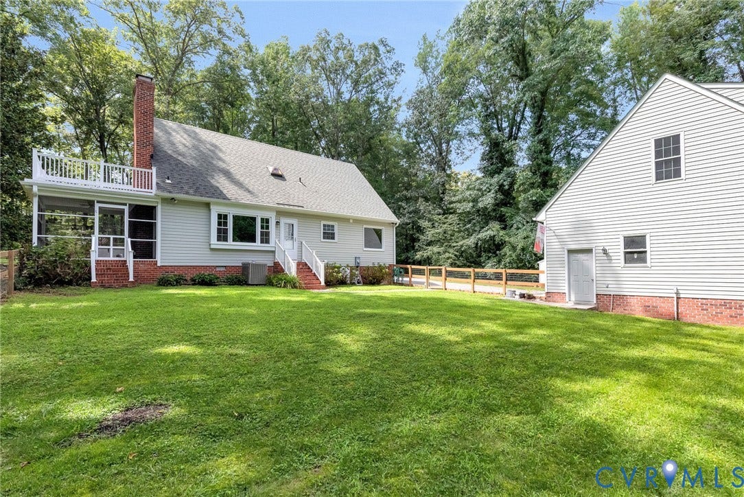 10478 Gould Hill Road, Studley, Hanover, VA 23069 Expansive green lawn with mature trees and a fenced area