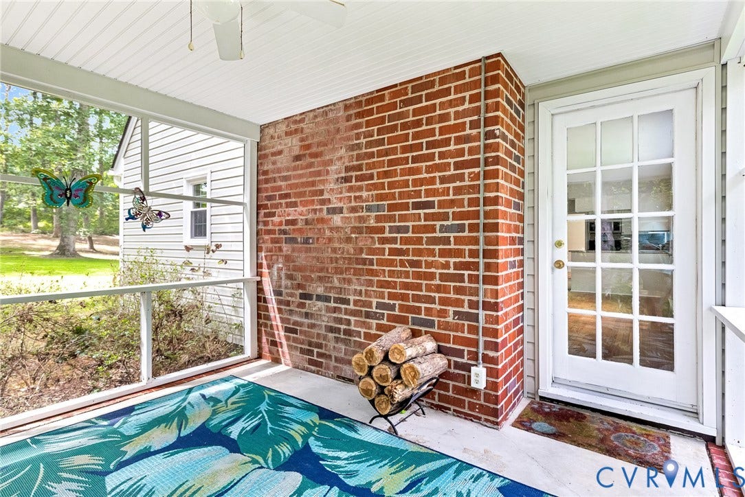 10478 Gould Hill Road, Studley, Hanover, VA 23069 View from within Screened porch with brick wall, white French-style door, and white paneled ceiling. Door leads into great room