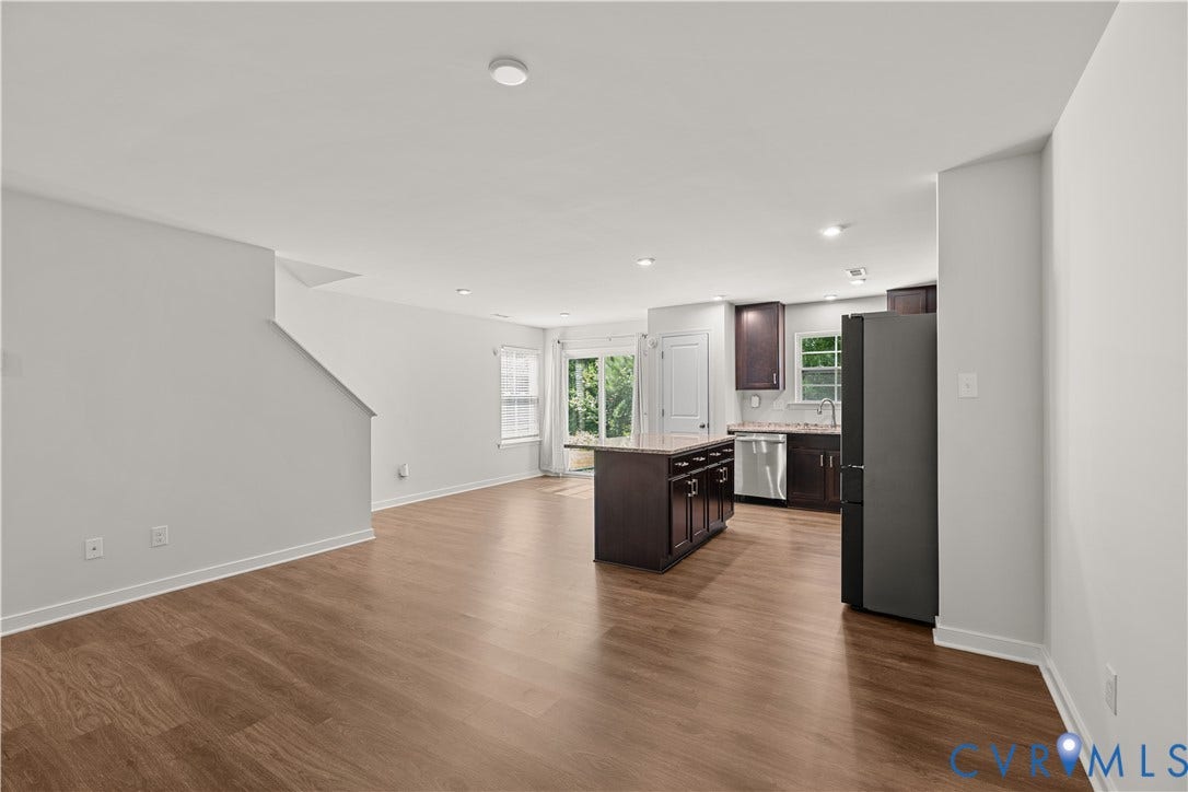3372 Dewsberry Lane, Henrico, VA 23231 Open concept living area with wood-finish flooring