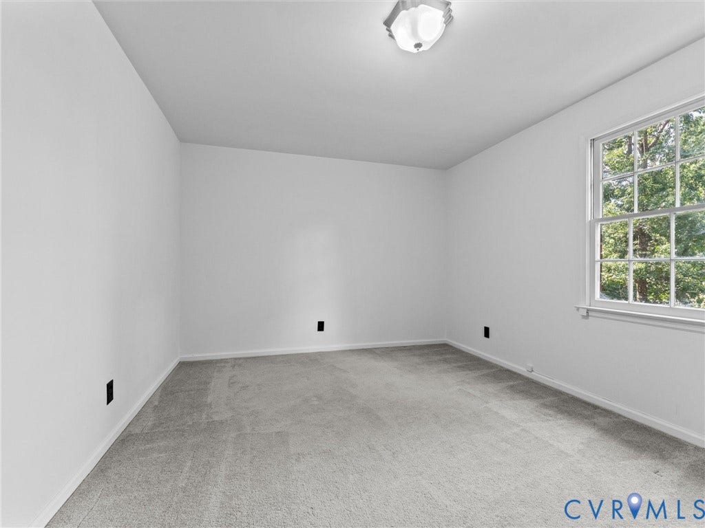 3610 Castlebury Drive, Chester, VA 23831 Wall-to-wall carpeting, white painted walls, and a multi-pane window