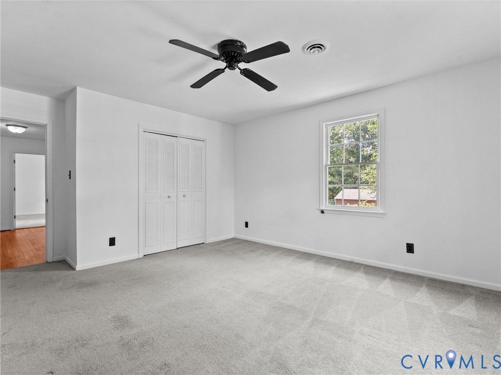 3610 Castlebury Drive, Chester, VA 23831 White walls, gray carpeting, and a window with white trim