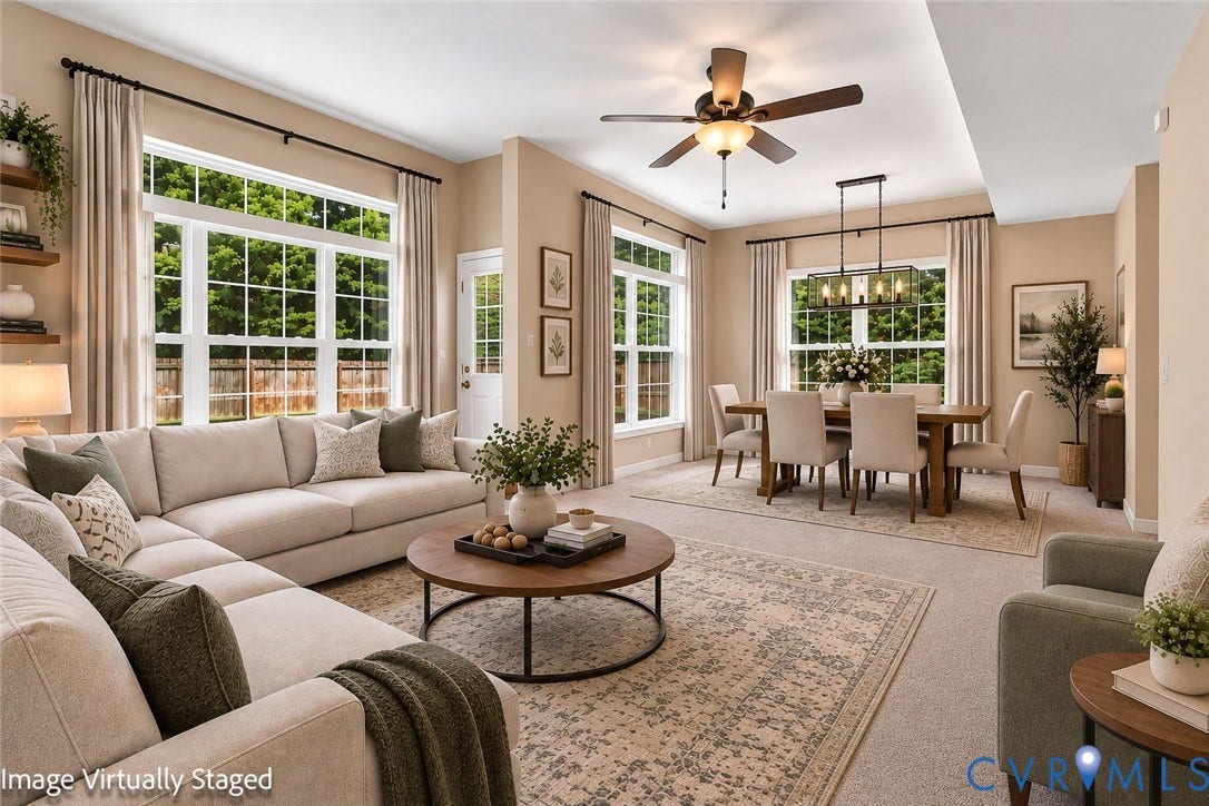 3818 Dominion Townes Circle, Dominion Townes, Richmond, VA 23223 Open-concept living and dining area featuring a tray ceiling, multiple large windows, and a ceiling fan with integrated lighting