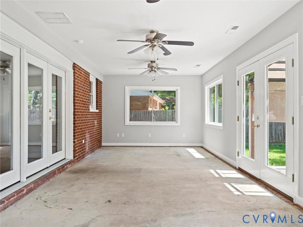 Large flex space - included in square footage, heated and cooled, french doors to interior and exterior, and side door access to driveway