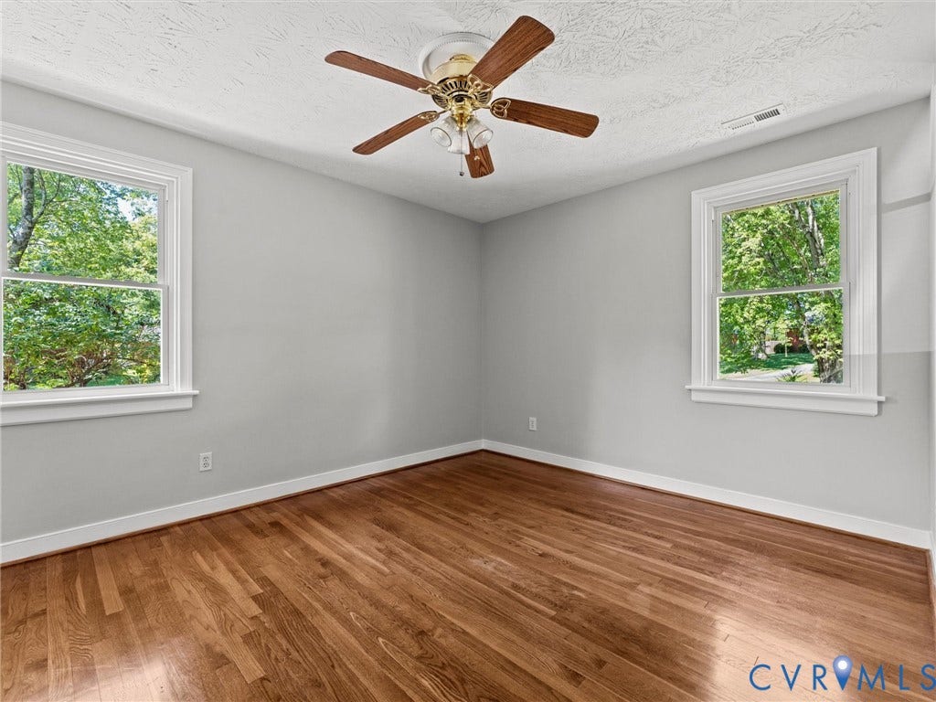 Bedroom 2 - fresh paint, ceiling fan, hardwoods, and closet