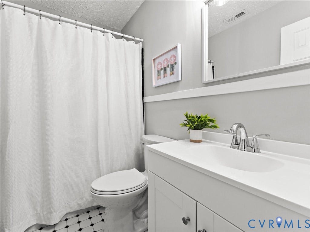 Hall bathroom - Newly updated with fresh paint, new fixtures and finishes, new vanity and toilet
