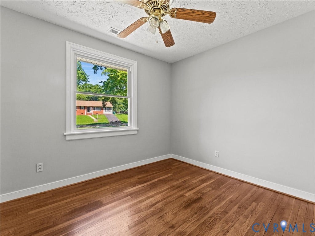 3rd bedroom - fresh paint, closet, hardwoods, ceiling fan