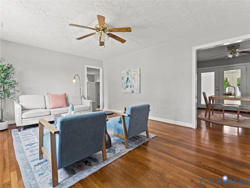 Bright and airy space with hardwood floors and fresh paint