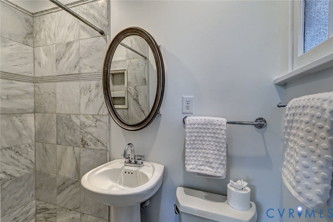 Pedestal sink and shower