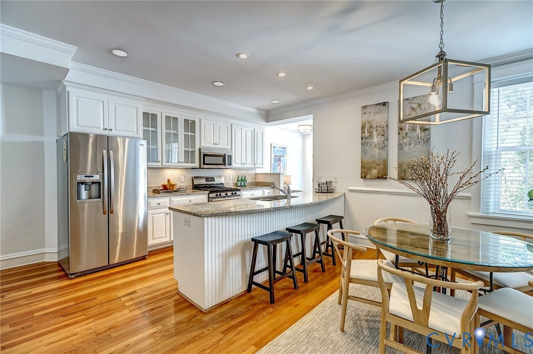 Bright, open-concept kitchen and dining area