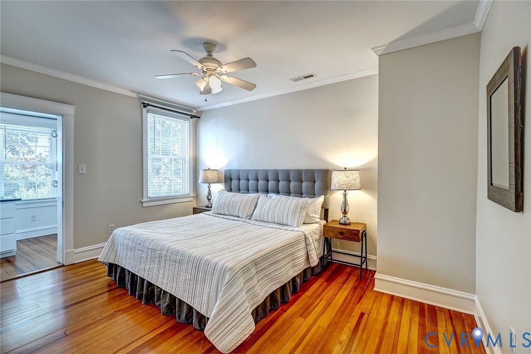 Suite has walk-in-closet with balcony and an en suite bathroom.