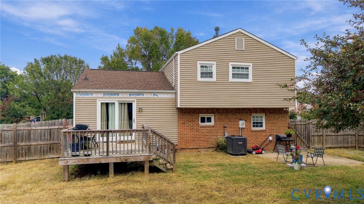 Wood deck featuring railing and stairs
