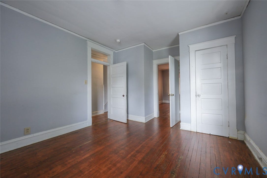 209 W 34th Street, Richmond, VA 23225 Hardwood flooring, painted walls, white trim, and multiple doorways