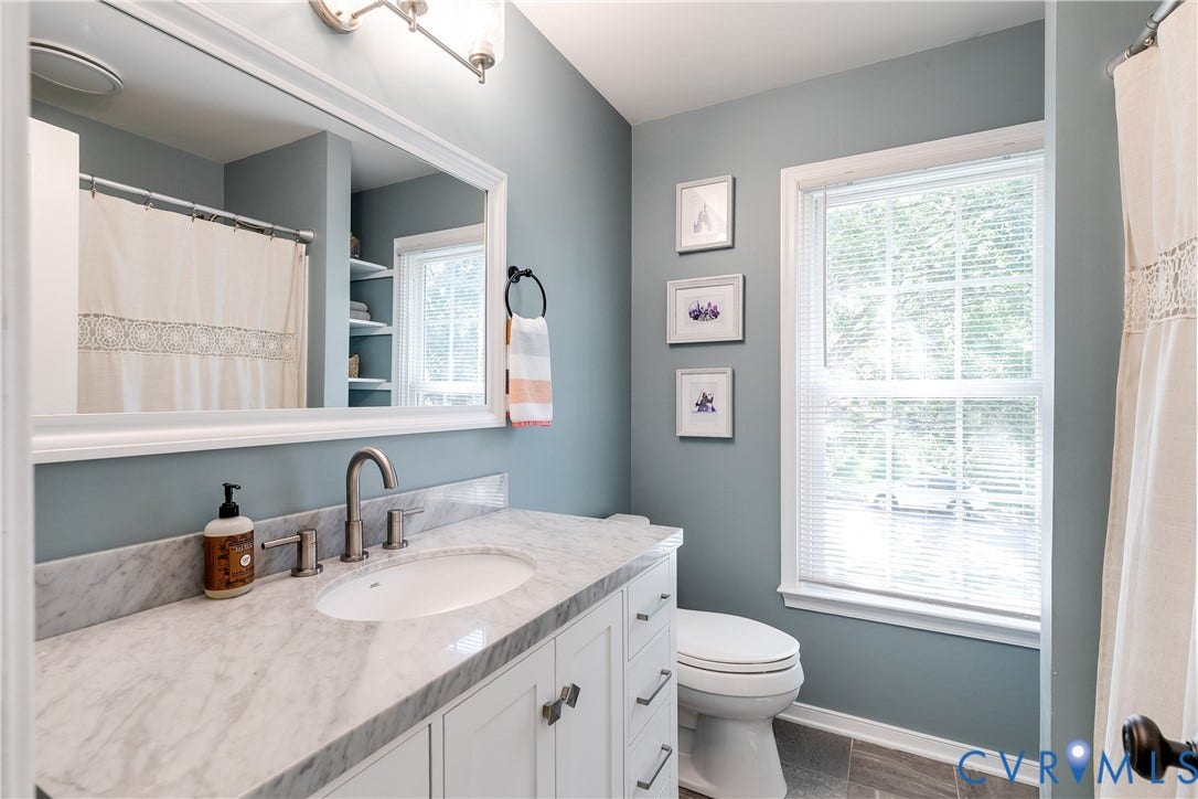 2844 Broadford Lane, Henrico, VA 23233 White vanity with a stone countertop and an undermount sink