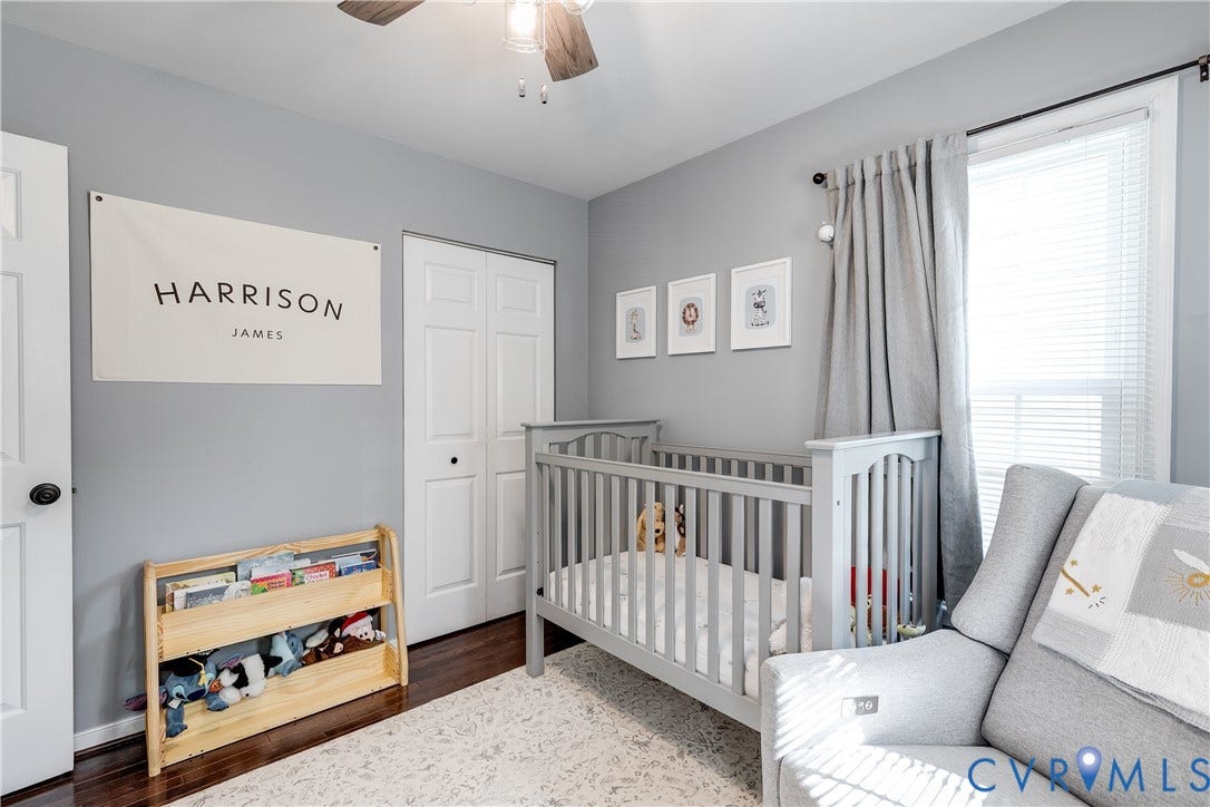 2844 Broadford Lane, Henrico, VA 23233 Recessed window with blinds, dark wood-finish flooring, white paneled door, ceiling fan with light fixture, and neutral wall color