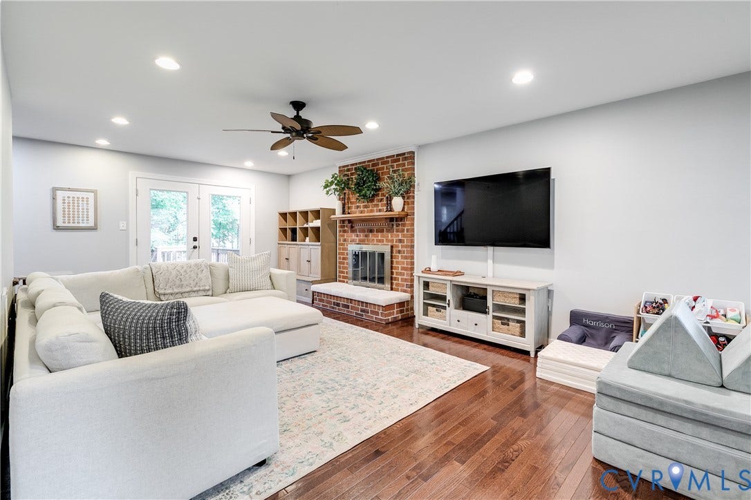 2844 Broadford Lane, Henrico, VA 23233 Hardwood flooring, brick fireplace with mantel, recessed lighting, ceiling fan, and French doors