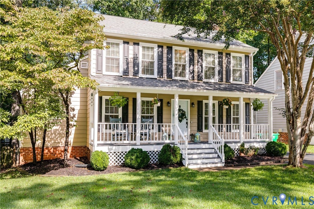 2844 Broadford Lane, Henrico, VA 23233 Two-story residence featuring a covered front porch, white railings, and dark louvered shutters