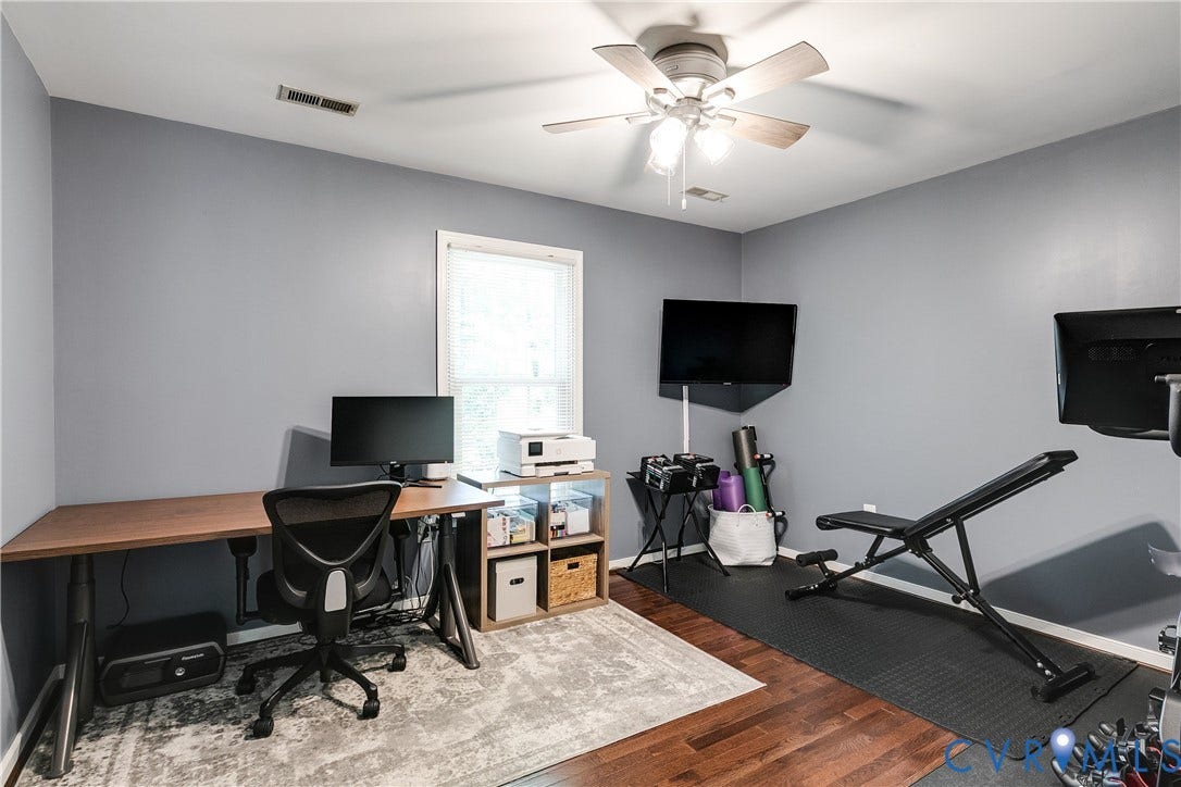 2844 Broadford Lane, Henrico, VA 23233 Room with wood-finish flooring, a ceiling fan with integrated lighting, and a window providing natural light