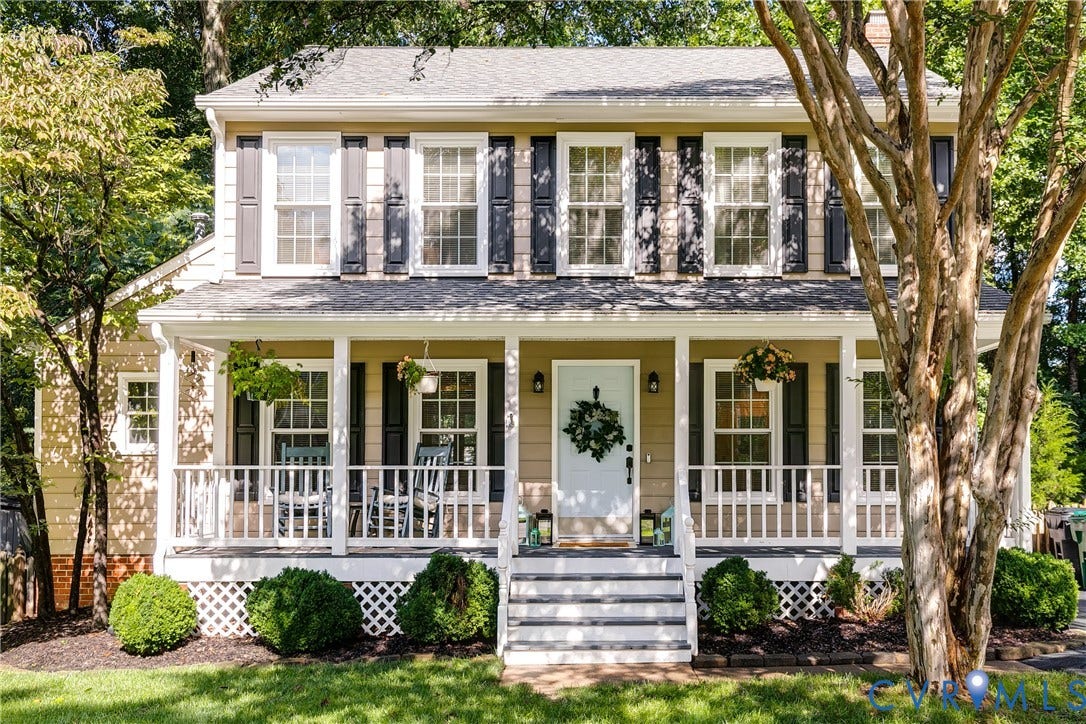 2844 Broadford Lane, Henrico, VA 23233 Two-story siding exterior with dark shutters, covered front porch, white railing, and exterior staircase