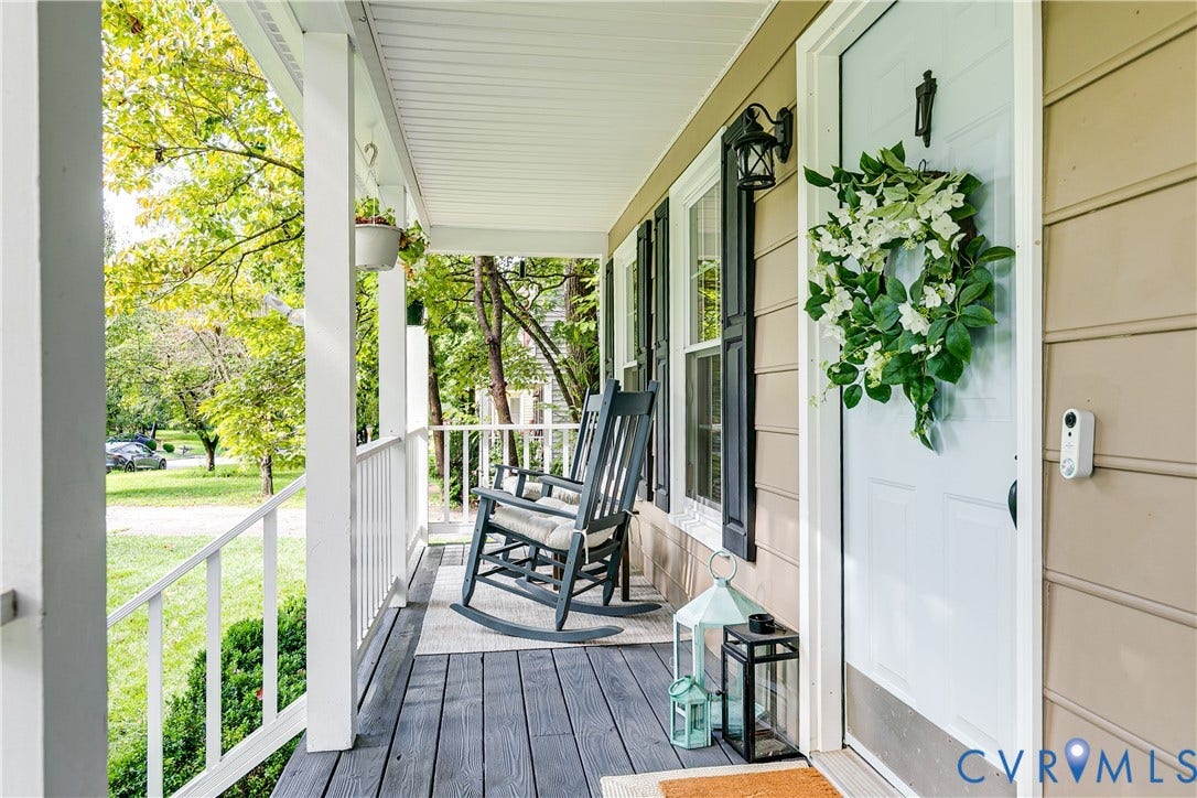 2844 Broadford Lane, Henrico, VA 23233 Covered front porch with dark wood-finish flooring, white railing, and exterior siding