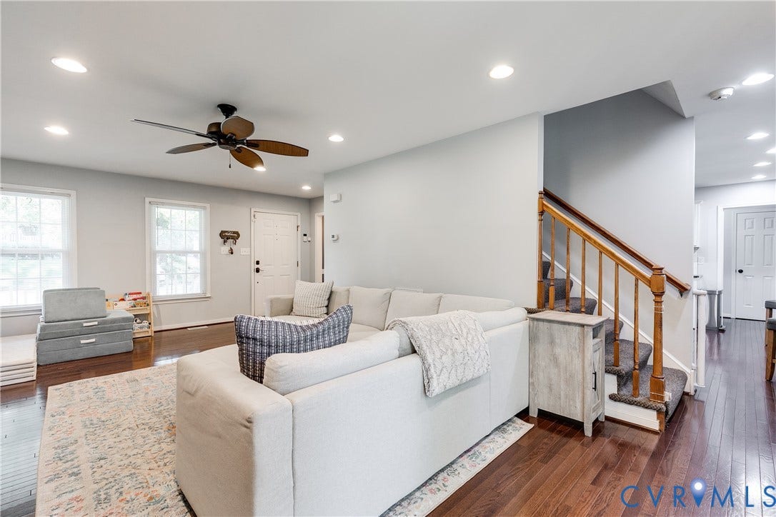 2844 Broadford Lane, Henrico, VA 23233 Recessed lighting, wood-finish flooring, staircase with wood railing, ceiling fan with integrated lighting, and multiple windows