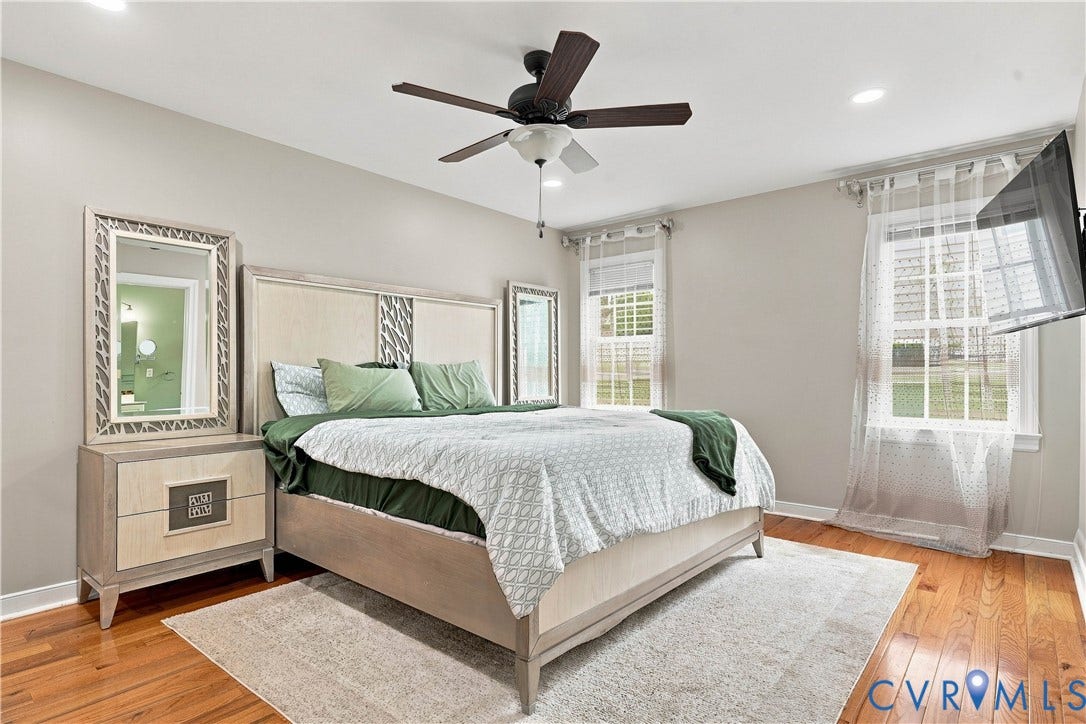 Master Bedroom Hardwood flooring, recessed lighting, and a ceiling fan with light fixture