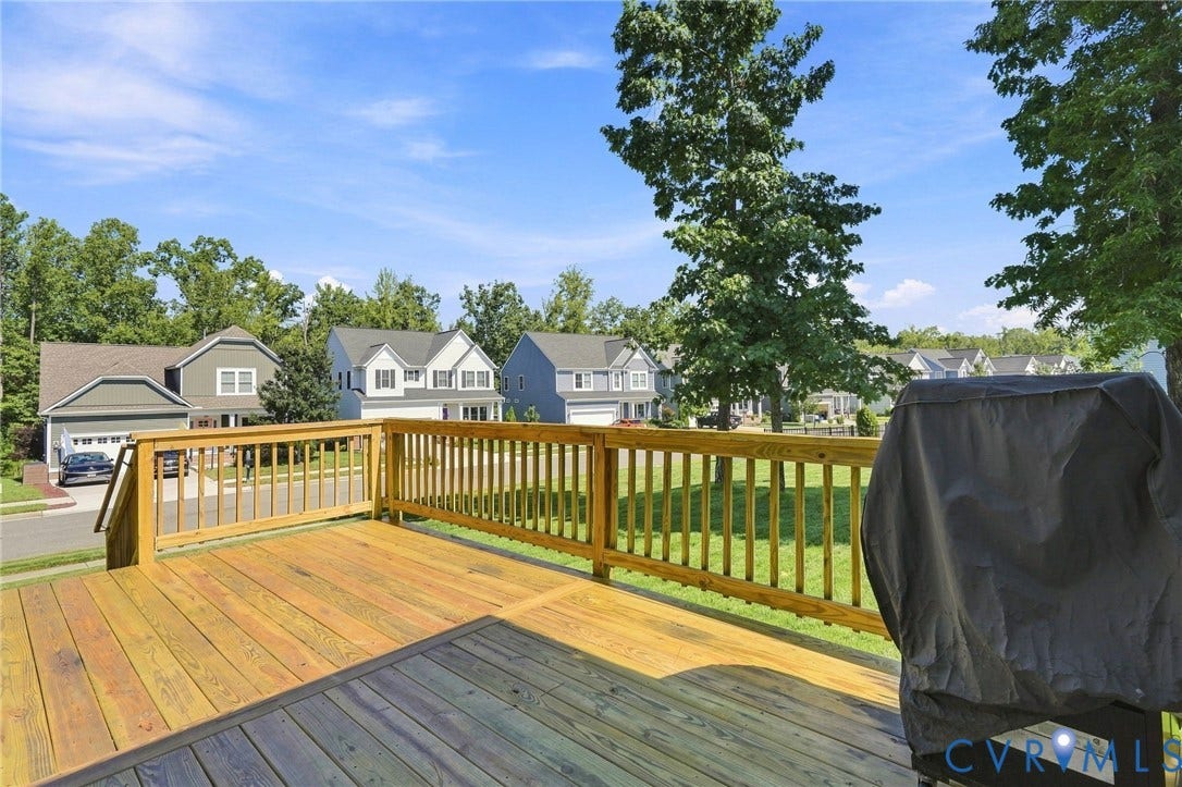 6400 Richwood Trail, Aston Oaks (Section 1), Chesterfield, VA 23120 Expansive outdoor deck with natural wood finish, offering a large entertaining area