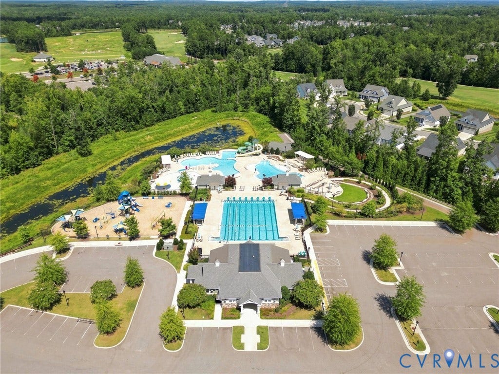 6400 Richwood Trail, Aston Oaks (Section 1), Chesterfield, VA 23120 Expansive community amenities including multiple swimming pools, dedicated children's play area, and a large clubhouse structure