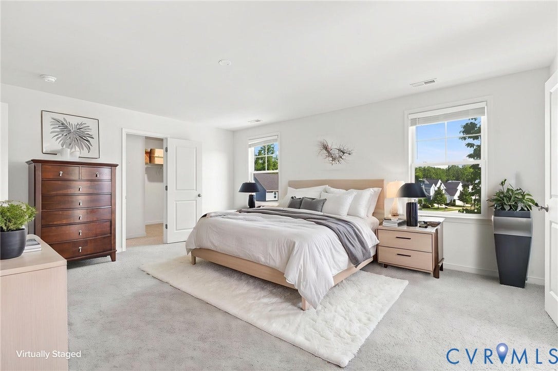 6400 Richwood Trail, Aston Oaks (Section 1), Chesterfield, VA 23120 Neutral wall color, two windows providing natural illumination, recessed lighting, carpeted flooring, and a walk-in closet with built-in shelving