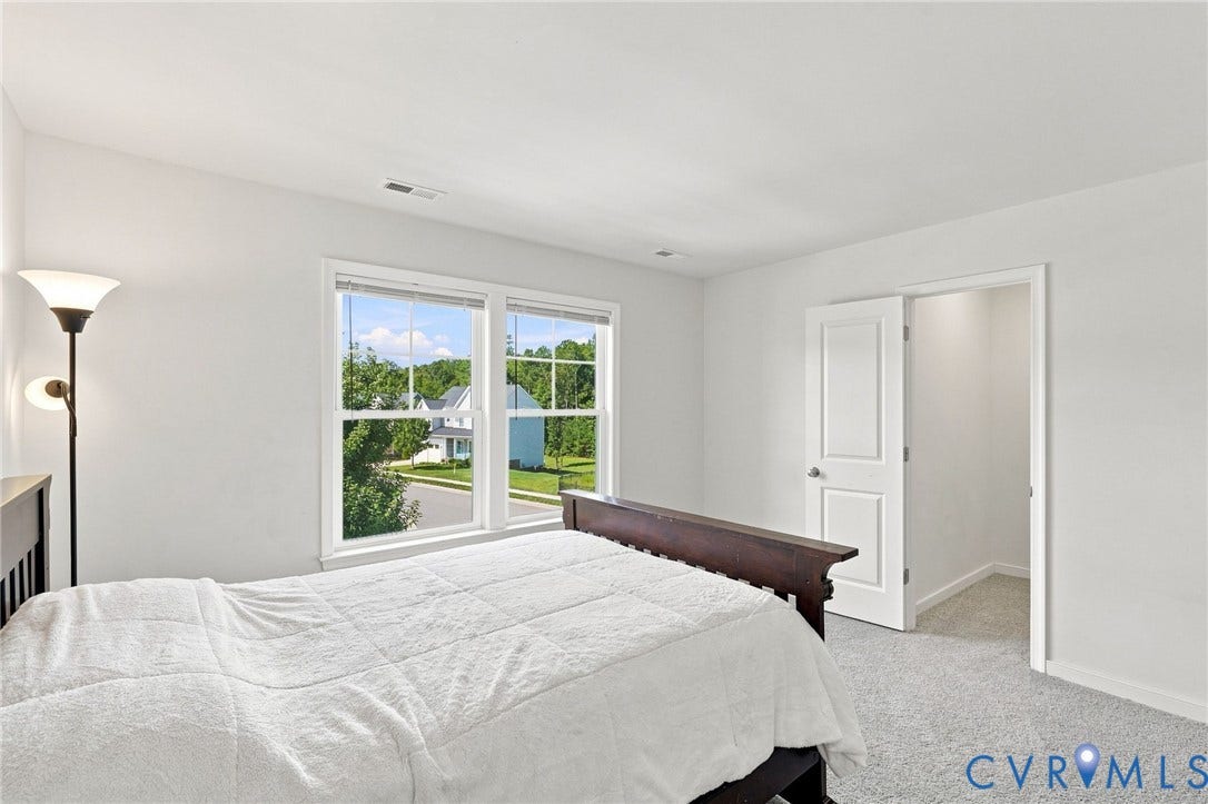 6400 Richwood Trail, Aston Oaks (Section 1), Chesterfield, VA 23120 Wall-to-wall carpeting with a neutral finish, featuring a double window and a solid panel door