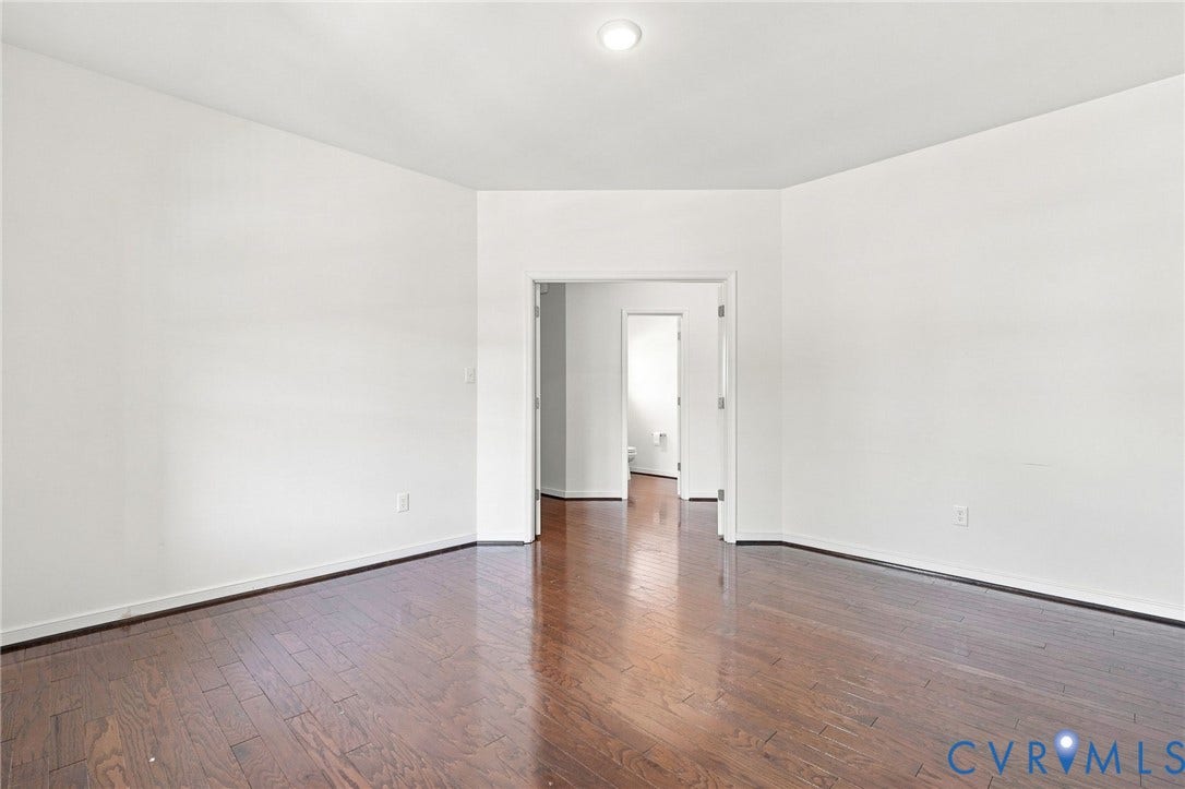 6400 Richwood Trail, Aston Oaks (Section 1), Chesterfield, VA 23120 Hardwood-finish flooring with a satin sheen, recessed ceiling lighting, and crisp white walls
