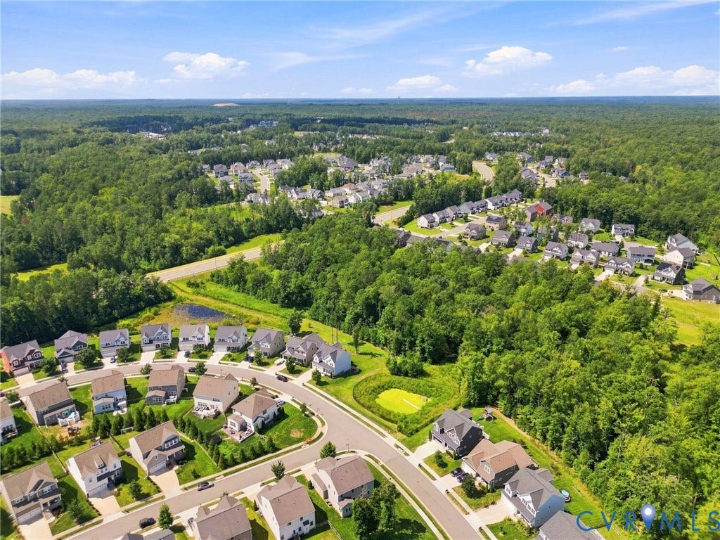 6400 Richwood Trail, Aston Oaks (Section 1), Chesterfield, VA 23120 Suburban neighborhood with established homes, paved streets, and surrounding mature woodland