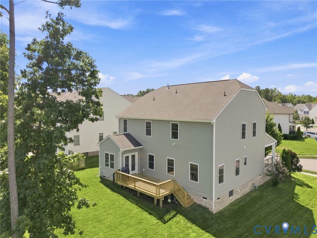6400 Richwood Trail, Aston Oaks (Section 1), Chesterfield, VA 23120 Expansive backyard with a manicured lawn, multi-level wood-finish deck, and partial stone foundation
