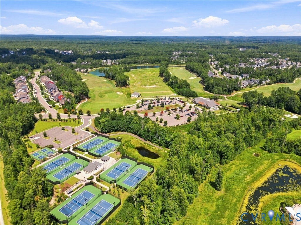 6400 Richwood Trail, Aston Oaks (Section 1), Chesterfield, VA 23120 Expansive recreational area featuring multiple tennis courts, a large parking area, and a golf course with water features