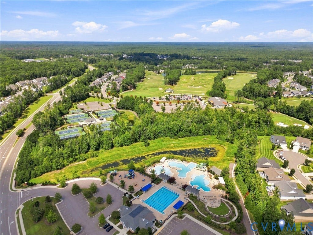 6400 Richwood Trail, Aston Oaks (Section 1), Chesterfield, VA 23120 Expansive aerial view showcasing residential areas, golf course, multiple tennis courts, and two swimming pools