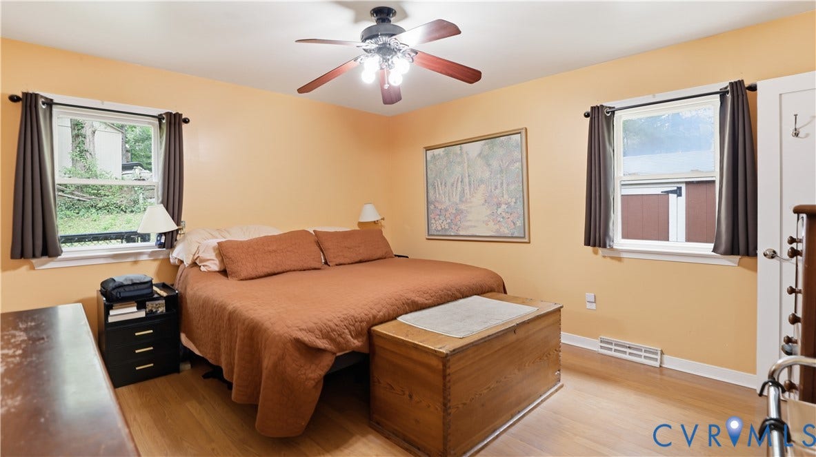 11201 Monday Way, Chesterfield, VA 23112 Hardwood-finish flooring, ceiling fan, and two windows with white trim