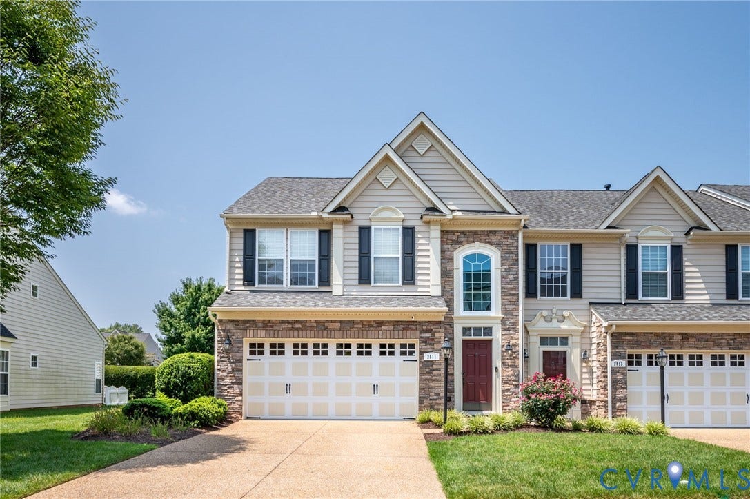 2811 Murano Way, The Villas At Hunton Park, Glen Allen, VA 23059 Stunning two-story Colonial featuring a brick and stone exterior with multiple gabled rooflines and architectural detail