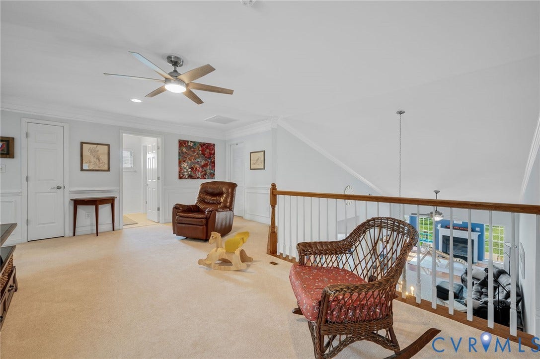 2811 Murano Way, The Villas At Hunton Park, Glen Allen, VA 23059 Carpeted room with a ceiling fan, wainscoting, and white trim