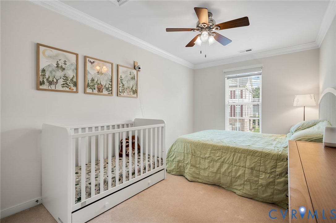 2811 Murano Way, The Villas At Hunton Park, Glen Allen, VA 23059 Neutral wall paint, crown molding, and a ceiling fan with integrated lighting