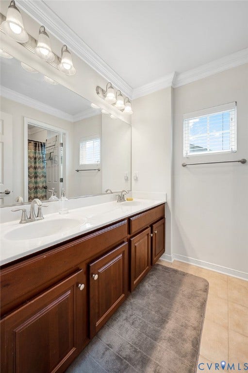 2811 Murano Way, The Villas At Hunton Park, Glen Allen, VA 23059 Dual vanity with wood-finish cabinetry, white countertop, and integrated sinks