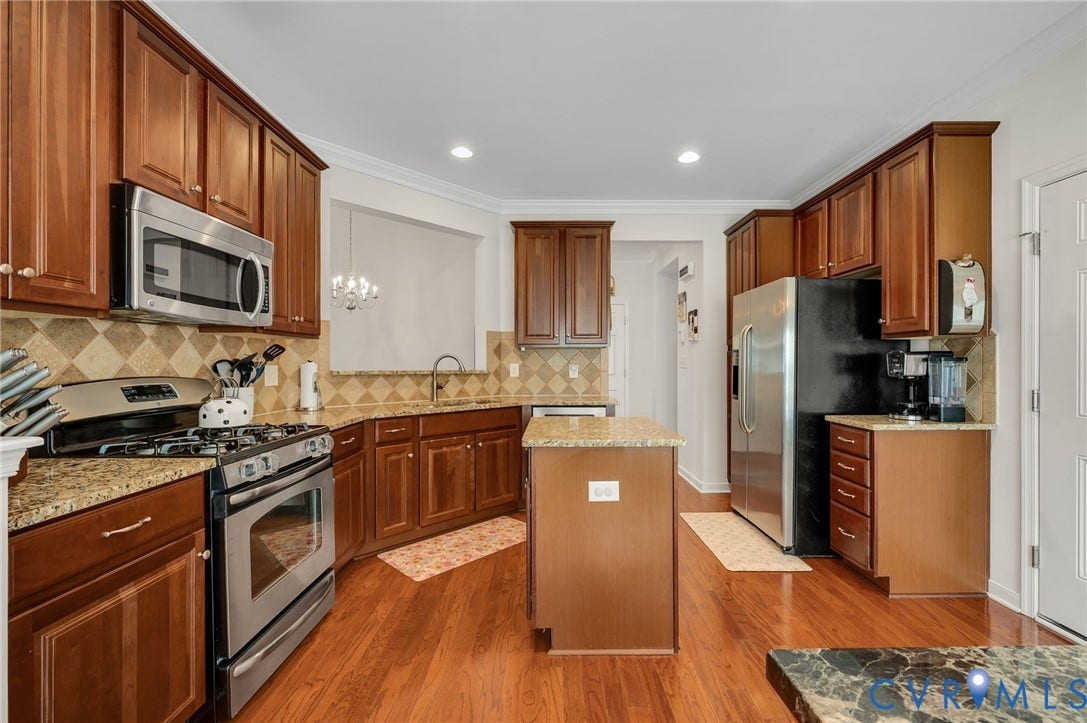 2811 Murano Way, The Villas At Hunton Park, Glen Allen, VA 23059 Wood-finish flooring with a central island and recessed lighting