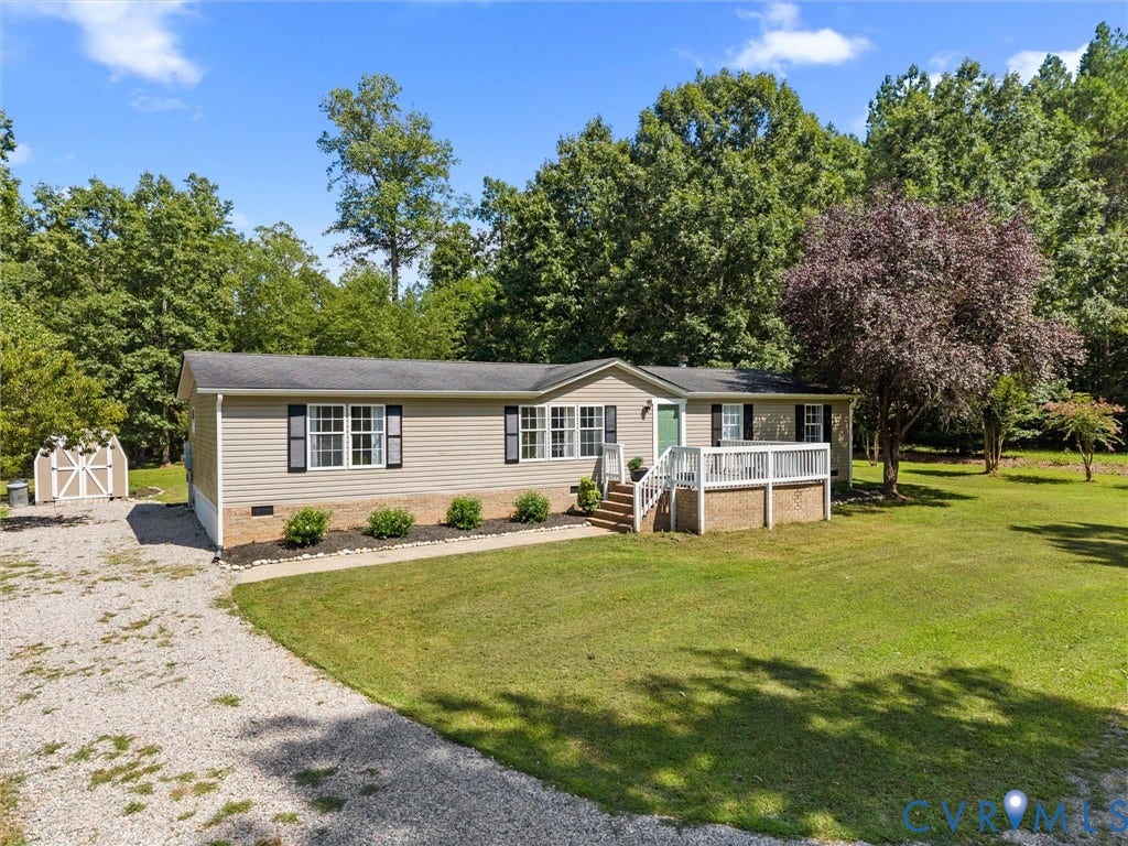 4554 Powhatan Lakes Road, Powhatan, VA 23139 Charming manufactured home situated on expansive grounds with mature landscaping
